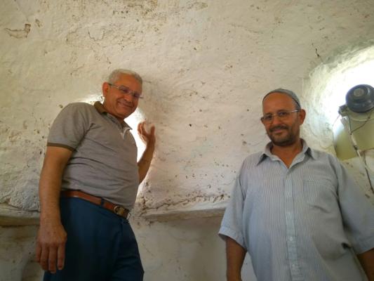 Residents showing the oldest local mosque